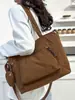 2026 Nueva Moda Gran Capacidad para Viajes Diario Color Sólido Bolso de Mano Diseño de Nicho Bolso de Hombro Casual Bolso Tote Perezoso