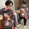 Roupas infantis para meninos suéter de outono e inverno camisa de base crianças médias e grandes 2023 Roupas de inverno suéter de gola redonda média para meninos atacado moda