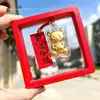 Lanyard de Celular Chaveiro Gato KT Desenho Animado Folha de Ouro Pingente Fio Vermelho Deus da Riqueza Caixa Vermelha Criativa Atividade de Trânsito Dirigindo Pequeno Presente