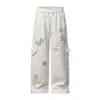 Calça feminina larga com estampa de estrelas estilo americano, nova coleção outono 2026, cintura elástica solta, calça casual versátil, moderna