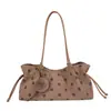 Bolso de mano de nicho de lunares de moda retro estilo coreano para mujer 2026 Otoño/Invierno Nuevo Versátil Gran Capacidad Bolso de Hombro para Viajes Diarios