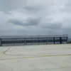 Puertas Eléctricas para Hangares de Aviones, Puertas Correderas de Hangar, Puertas Eléctricas Grandes para Hangares de Aviones, Galería de Hangar Plegable Resistente al Viento