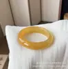 Venta al por mayor del fabricante Pulsera de Jade Natural Huanglong, Pulsera de Jade Color Dorado Champagne de Hielo Alto, Pulsera de Barra Plana de Jade Amarillo, Venta al por mayor de Joyería