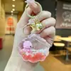 Llavero Creativo Serie Océano Relleno de Aceite Pez Payaso Estrella de Mar Pez Pequeño Colgante de Bolso Decoración de Llavero