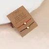 Joias de aço titânio aço inoxidável cruzadas amor dourado corda vermelha tecida à mão ajustável joias para amantes namoradas atacado