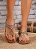 En stock 2026 nuevas sandalias de estilo europeo y americano, sandalias planas cómodas de estilo bohemio con pedrería, punta redonda, para vacaciones en la playa, talla grande