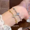 Pulsera extensible con colgante de flor de circón estilo francés, pulsera sencilla y moderna para el día a día, lujo ligero con un toque de alta gama, joyería versátil