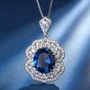 Joias Huabi Novas para Outono e Inverno Base de Cobre Banhada a Ouro Corindo Vermelho Sintético Cristal de Safira Conjunto de Alto Padrão para Mulheres 12*14