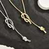 Cadena de Suéter Nudo Personalizada Europea y Americana Transfronteriza Española Otoño e Invierno con Diseño de Nicho, Estilo Retro, Sencillo y Elegante