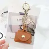 Bolsita Creativa para Guardar Auriculares, Billetera Pequeña, Llavero, Colgante para Bolso, Mini Bolsita de Almacenamiento Pequeña de Cuero