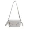 Bolso cruzado de un solo hombro de moda nuevo para la primavera de 2026 para mujer, bolso pequeño texturizado elegante, bolso cuadrado pequeño de color liso