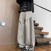 Novo design esportivo patchwork estilo americano de 2026 com três listras, calça de moletom casual com toque de alta qualidade, calça longa de corte solto para adolescentes