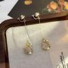 Clip para oreja francés de alta gama sin agujeros en la oreja para mujer, clip para oreja triangular de temperamento simple, lujo ligero sin agujeros en la oreja, aretes al por mayor de Yiwu