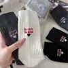 Nuevos calcetines de mujer para otoño e invierno, calcetines de algodón puro hasta la pantorrilla, estilo coreano con rayas verticales y bordado de letras de corazón, calcetines largos apilables de doble aguja