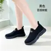 Al por mayor transfronterizo Flyknit deportivas inflables suela ligera zapatos de mujer 2026 Primavera/Otoño sin cordones persona perezosa moda versátil para mujer en stock