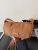 Bolso de mano de alta gama transfronterizo, nueva colección otoño/invierno 2026, diseño retro y minimalista, bolso de hombro pequeño y único, bolso cruzado de gamuza