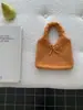 Bolso de punto de lana estilo coreano para otoño e invierno con correa de amarre, adecuado para el trabajo, gran capacidad, nicho, bolso de hombro versátil