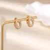 Moda Transfronteiriça Europeia e Americana Brincos em Forma de U Exquisitos Cravejados de Diamantes Brincos Versáteis Elegantes em Forma de Cobra Novo Estilo 2025