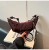 Bolsa pequena retrô de design de nicho transfronteiriça feminina nova super quente bolsa de chifre couro encerado bolsa de bolinho bolsa de ombro única transversal