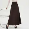 Saia Midi de Tricô Floral Estilo Coreano Feminina Outono 2026 Nova Cintura Elástica Linha A Versátil Caimento Longa Saia Evasê