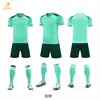 Conjunto de jersey de fútbol de secado rápido en stock, uniforme de entrenamiento para club escolar, corte holgado de manga corta, tallas grandes, jersey estampado por transferencia de calor, venta al por mayor