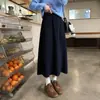 Falda de Lana Acetato Chun Bu Wan de 6 Paneles con Botón Único Fruncido Abdominal Plegado Hacia Adentro Cintura Elástica Otoño/Invierno Falda Larga con Bolsillo Falda Midi