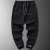 Pantalones Hombre Primavera y Otoño Moda ins Nueve Puntos Guapo Estudiante Pareja Casual Deportivos Pantalones de Chándal Hombre