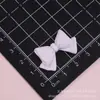 Pajarita nudo de mariposa DIY accesorios hechos a mano caseros pegamento de crema casero funda de teléfono accesorios para el cabello materiales Accesorios de resina para Crocs