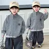 Chaqueta de Punto Rayada con Cuello Alto para Niños Otoño 2026 Nueva Chaqueta Casual Holgada para Bebé Top de Moda