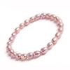 Pulsera de perlas al por mayor para mujer, pulsera de perlas naturales de agua dulce, cuentas de mijo, pulsera de cuerda elástica, nicho simple de lujo ligero