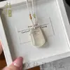 Colgante de Piedra Ojo de Gato con Cierre de Paz para Mujer, Collar de Calcedonia con Cierre Ruyi Multicolor, Nuevos Accesorios de Estilo Chino Nacional, Suministro Mayorista para Transmisión en Vivo