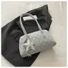 Bolsa de mão com textura de nicho bolsa bowling 2026 outono nova simples bolinhas bolsa de ombro única para ir ao trabalho