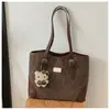 Bolsa Transfronteriza de Gran Capacidad para Mujer 2026 Nuevo Mate de Viaje Retro Bolso de Hombro Estudiante Universitario Bolsa de Mano para Clase