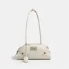Bolsas de mujer personalizadas OEM de fábrica de Guangzhou, bolso baguette simple y versátil, bolso de hombro y cruzado, suministro al por mayor