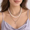 Collar de cuentas multicapa apiladas, estilo punk transfronterizo europeo y americano, dulce y moderno, collar de estrella simple, joyería de perlas de imitación