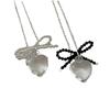 Collar de cadena de clavícula de alta gama con diseño de estilo coreano, plata de ley S925, corazón transparente y lazo acrílico.