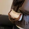 Popular bolso bandolera vintage para mujer de nicho verano 2026, elegante bolso de hombro para llevar bajo el brazo para ir al trabajo, nueva moda de lujo ligero