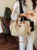2026 Bolso de Tela de Moda Nuevo Estilo Coreano Gran Capacidad Multifuncional Bolso Tote para Niñas Bolso de Mano Transfronterizo Vintage Bolso de Hombro