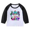 Camiseta infantil de primavera y otoño 2023, nueva camiseta de manga larga con cuello redondo y dibujos animados, camiseta de algodón para bebés y niños.