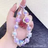 Celebridad de Internet Moda Trébol de Cuatro Hojas Color Bolas Bolso Accesorios Colgante Cadena para Teléfono Móvil Super Hada Cristal Colgante Colgante de Bolas