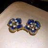 Aretes vintage de plata con flores incrustadas de diamantes, aretes de estilo corte retro, aretes de lujo ligero de alta gama al por mayor