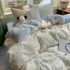 Juego de ropa de cama de cuatro piezas para maternidad e infancia Clase A, sábana de algodón lavado imitación algodón antibacteriana, funda de edredón, sábana bajera, juego de tres-cuatro piezas para dormitorio individual de estudiante