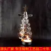 Suministro directo de fábrica lámpara de viento giratoria de cobre estilo en forma de árbol de Navidad producción hueca candelabro artesanías producción al por mayor