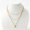 Cadena de Perlas Oceánicas de Venta Caliente Transfronteriza Europea y Americana Cadena para Clavícula de Mujer Colgante de Estrella de Mar y Concha Collar Multicapa Apilable Venta al por Mayor