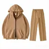 Conjunto de sudadera unisex negra con capucha y cierre, que incluye una sudadera holgada abierta por delante y pantalones de chándal de pierna recta con cordones, un conjunto de dos piezas
