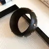 Pulsera Cerrada de Madera Estrella Retro Lujo Ligero Moda de Gama Alta Exquisito Anillo de Mano Personalidad Versátil Temperamento Joyería de Mano para Mujeres