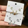 Pendientes de Planeta Luna Nuevos Compactos Micro-pavimentados de Zirconia Estilo Ins Nicho Diseño Simple Versátil Pendientes de Gama Alta