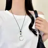 Colar pingente anel gota d'água oco longo para mulheres, corrente de suéter de luxo leve de nicho de alta qualidade com acessório de cordão preto ajustável