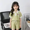 2026 Novo Estilo Conjunto de Duas Peças Verão para Meninas Estilo Coreano com Gola Lapela Manga Curta e Cerejas de Desenho Animado, Shorts Estiloso Estilo Princesa