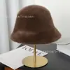 Sombrero de pescador estilo coreano con felpa cruzada, sombrero tipo cubo cálido de invierno versátil con pelo sintético de visón, sombrero de estilo popular con protección para los oídos engrosada, venta al por mayor